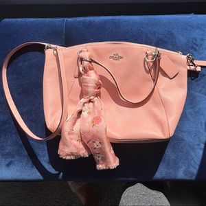 Pink leather Coach bag, very good condition. Comes with coach scarf. 13” x 9”